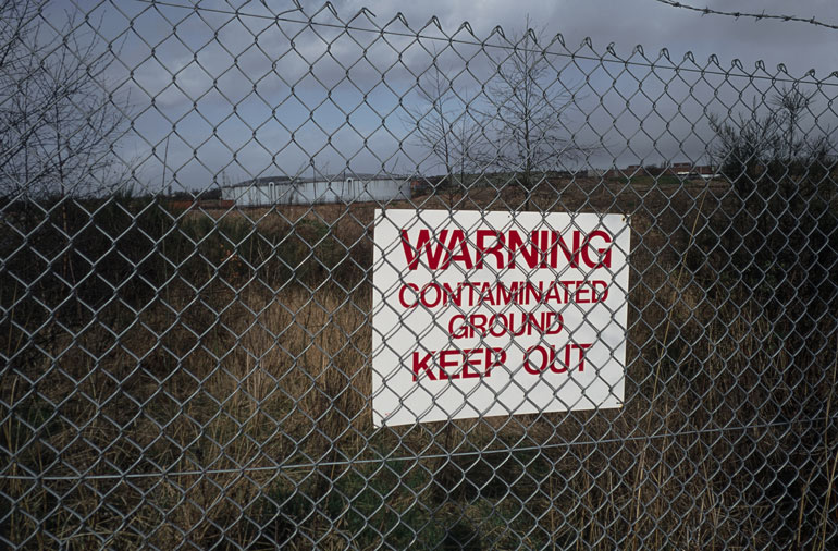 warning contaminated ground keep out sign